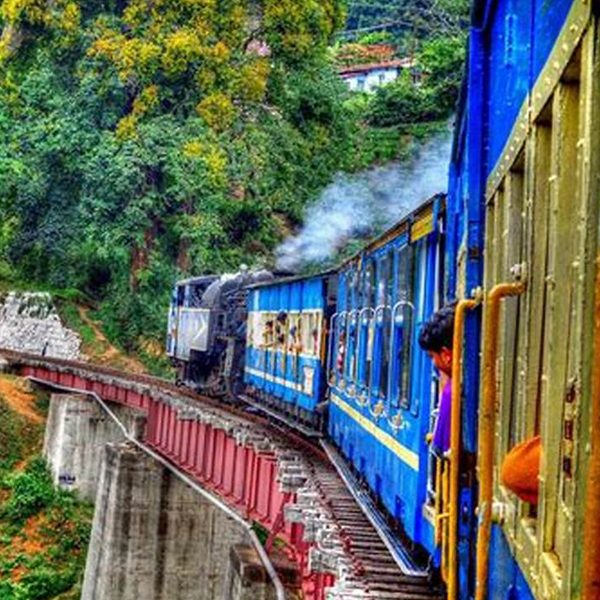 Classic blue Nilgiri Mountain Railway train, a UNESCO World Heritage Site.