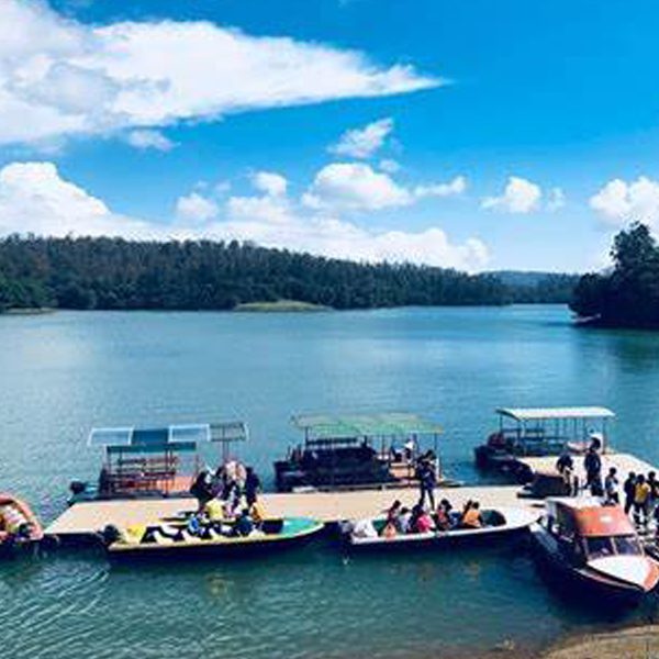 Ooty Lake surrounded by lush greenery at The Nest Inn Resort